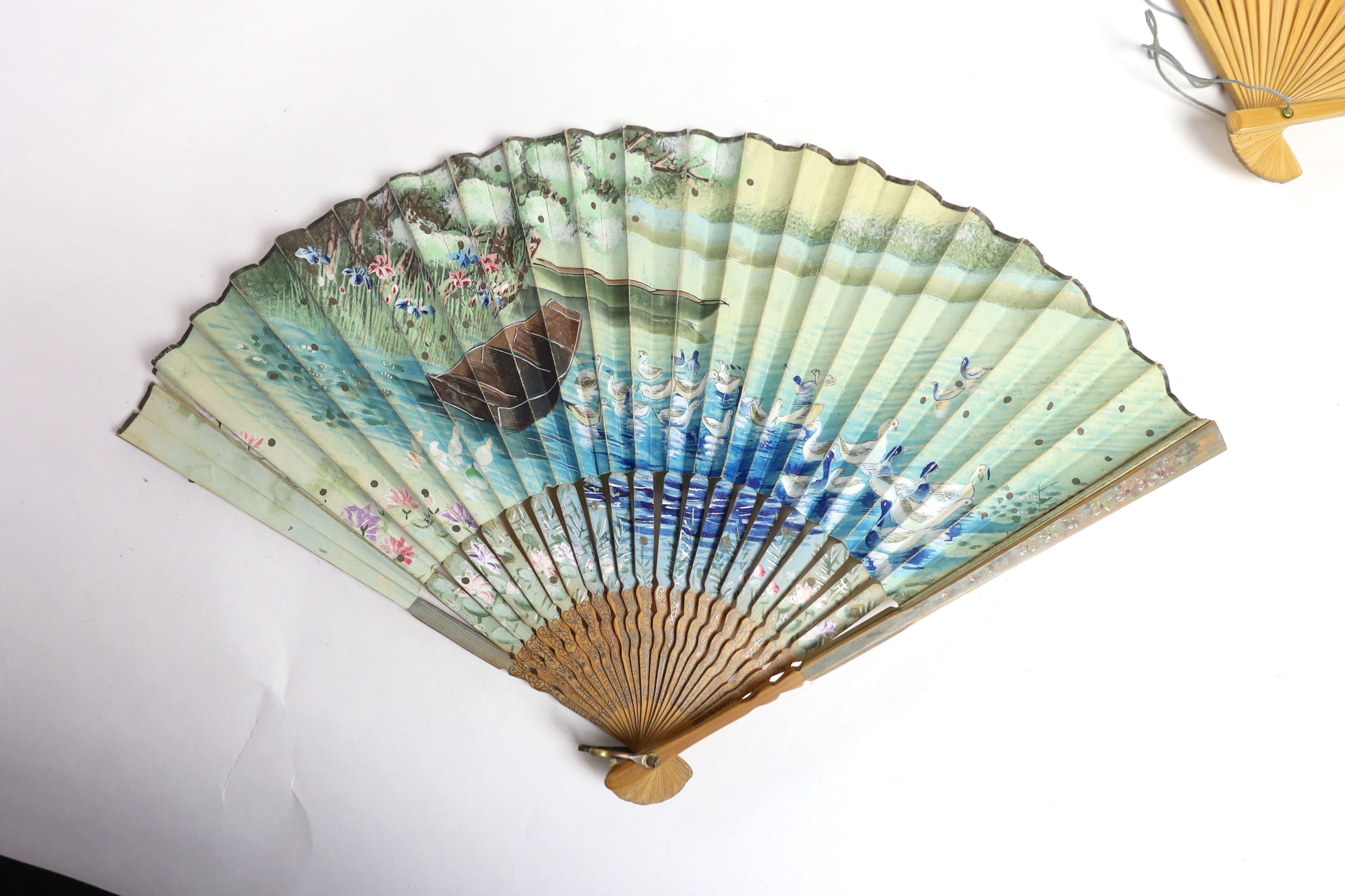 A collection of 19th and 20th century mostly paper fans, ten in reasonable condition useful for stage and film (16)